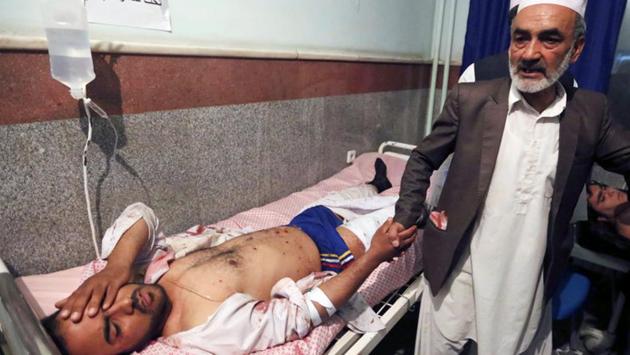 Abdulhai Walizada, a local police spokesman, said there appeared to be more than one attacker on Tuesday, with witnesses describing a suicide bomber who detonated explosives and at least one other, a gunman who threw grenades at worshippers. (Mohammad Shoib / REUTERS)