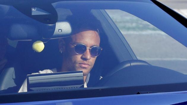 Brazilian football player Neymar drives to arrive at the Joan Gamper training camp near Barcelona. (Reuters) Brazilian football player Neymar drives to arrive at the Joan Gamper training camp near Barcelona. (Reuters)