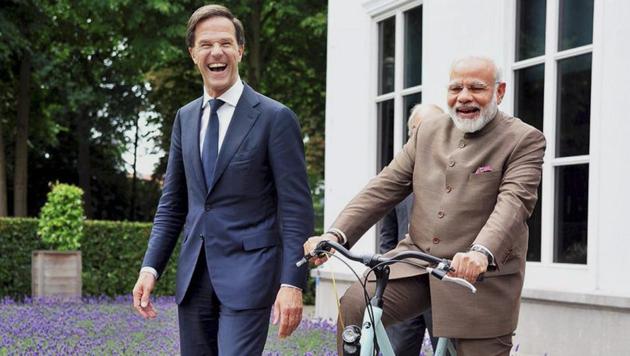 Prime Minister Narendra Modi with a bicycle gifted to him by Dutch Prime Minister Mark Rutte, in The Hague, Netherlands in Julast months in June. (PTI) Prime Minister Narendra Modi with a bicycle gifted to him by Dutch Prime Minister Mark Rutte, in The Hague, Netherlands in Julast months in June. (PTI)
