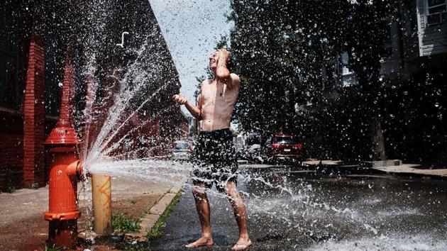 Jimmy, a heroin addict from South Jersey, showers and washes his clothes in an open fire hydrant in Philadelphia. Opioid-use disorder (OUD) has been linked to homelessness among veterans with a risk factor 10 times greater than the general veteran population. Homeless adults aged 25-44 were also nine times more likely to die of overdose compared to their stable homed counterparts with opioids forming 80% of all overdose deaths. (Spencer Platt / Getty Images / AFP) Jimmy, a heroin addict from South Jersey, showers and washes his clothes in an open fire hydrant in Philadelphia. Opioid-use disorder (OUD) has been linked to homelessness among veterans with a risk factor 10 times greater than the general veteran population. Homeless adults aged 25-44 were also nine times more likely to die of overdose compared to their stable homed counterparts with opioids forming 80% of all overdose deaths. (Spencer Platt / Getty Images / AFP)