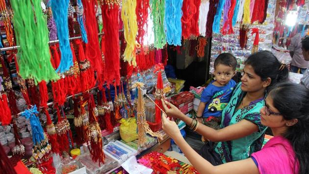 Colorful rakhis displayed in Jamblinaka Market in Thane.(Praful Gangurde/HT Photo)