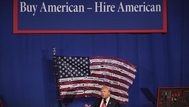 President Donald Trump speaks to workers at the headquarters of tool manufacturer Snap-On in Kenosha, Wisconsin. During the visit, Trump signed an executive order to try to bring jobs back to American workers and revamp the H-1B visa programme. (AFP File Photo) President Donald Trump speaks to workers at the headquarters of tool manufacturer Snap-On in Kenosha, Wisconsin. During the visit, Trump signed an executive order to try to bring jobs back to American workers and revamp the H-1B visa programme. (AFP File Photo)