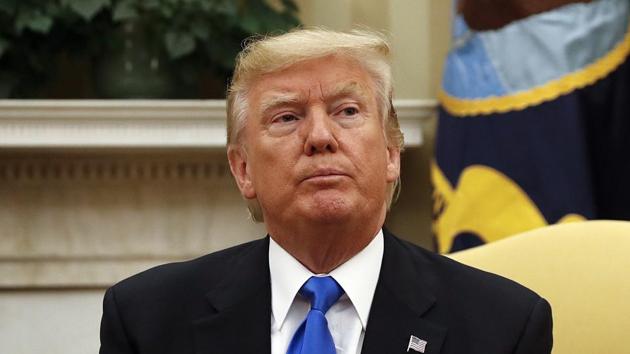US President Donald Trump sits in the Oval Office of the White House in Washington. (AP file) US President Donald Trump sits in the Oval Office of the White House in Washington. (AP file)