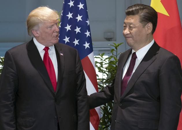 US President Donald Trump and Chinese President Xi Jinping meet on the sidelines of the G20 Summit in Hamburg on July 8, 2017. (AP) US President Donald Trump and Chinese President Xi Jinping meet on the sidelines of the G20 Summit in Hamburg on July 8, 2017. (AP)