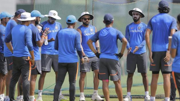 India captain Virat Kohli, center facing camera, speaks to his team members during a training session ahead of their second test cricket match with Sri Lanka in Colombo. (AP) India captain Virat Kohli, center facing camera, speaks to his team members during a training session ahead of their second test cricket match with Sri Lanka in Colombo. (AP)