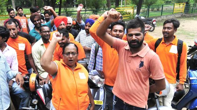 Uber ‘baxi’ drivers protest against the company in Phase 9, Mohali, on Wednesday. (Ravi Kumar/HT) Uber ‘baxi’ drivers protest against the company in Phase 9, Mohali, on Wednesday. (Ravi Kumar/HT)