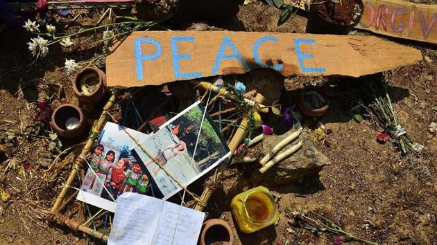 Photograph taken in March shows artifacts placed by mourners at the site where the body of Irish tourist Danielle McLaughlin was found in Canacona, about 60km south of Panaji, in Goa.(AFP Photo)