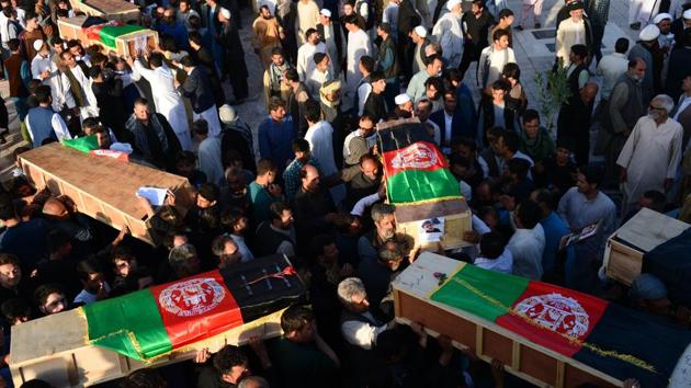 Afghan protesters carry coffins of victims as they shout against the Islamic State group following a mosque attack that killed 33 people in Herat on August 2, 2017. (AFP Photo) Afghan protesters carry coffins of victims as they shout against the Islamic State group following a mosque attack that killed 33 people in Herat on August 2, 2017. (AFP Photo)
