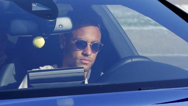 Neymar drives to the Joan Gamper training camp near Barcelona ahead of his move to Paris Saint Germain. (REUTERS) Neymar drives to the Joan Gamper training camp near Barcelona ahead of his move to Paris Saint Germain. (REUTERS)