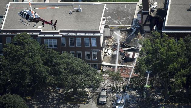 Emergency workers respond to an explosion at Minnehaha Academy in Minneapolis Wednesday, Aug. 2, 2017. Assistant Fire Chief Bryan Tyner said it appears the explosion may have been caused by a ruptured gas line, but that the investigation is ongoing. (AP Photo) Emergency workers respond to an explosion at Minnehaha Academy in Minneapolis Wednesday, Aug. 2, 2017. Assistant Fire Chief Bryan Tyner said it appears the explosion may have been caused by a ruptured gas line, but that the investigation is ongoing. (AP Photo)