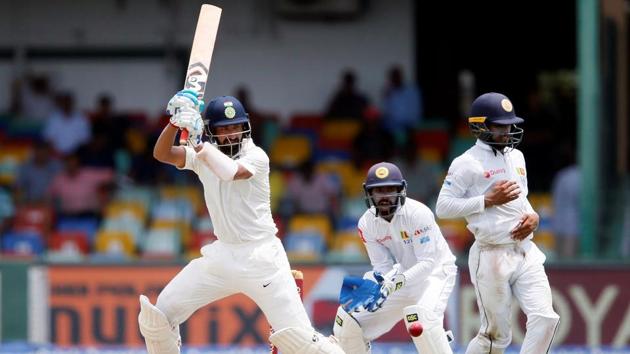 Cheteshwar Pujara in action during the second Test of the three-match series between India vs Sri Lanka. Catch full cricket score of India vs Sri Lanka, 2nd Test, Day 1 here(REUTERS)