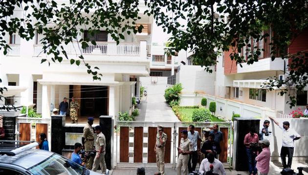 Security and media outside Karnataka Energy minister D K Shivakumar's residence in Bengaluru on Wednesday. (PTI Photo) Security and media outside Karnataka Energy minister D K Shivakumar's residence in Bengaluru on Wednesday. (PTI Photo)