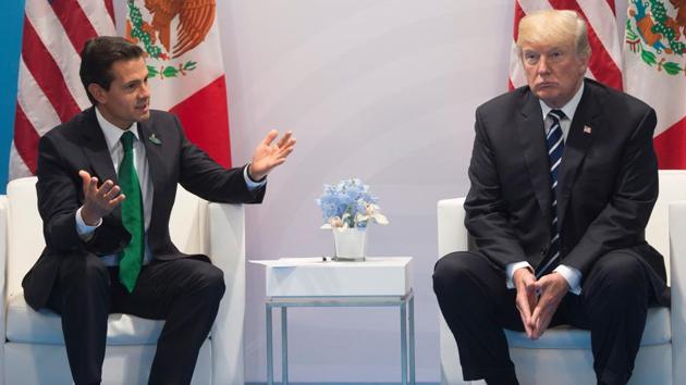This file photo taken on July 7, 2017, shows US President Donald Trump and Mexican President Enrique Pena Nieto holding a meeting on the sidelines of the G20 Summit in Hamburg, Germany. (AFP File Photo) This file photo taken on July 7, 2017, shows US President Donald Trump and Mexican President Enrique Pena Nieto holding a meeting on the sidelines of the G20 Summit in Hamburg, Germany. (AFP File Photo)
