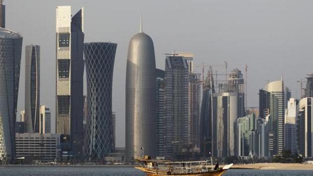 FILE - In this Thursday Jan. 6, 2011 file photo, a traditional dhow floats in the Corniche Bay of Doha, Qatar, with tall buildings of the financial district in the background. (AP) FILE - In this Thursday Jan. 6, 2011 file photo, a traditional dhow floats in the Corniche Bay of Doha, Qatar, with tall buildings of the financial district in the background. (AP)