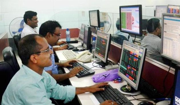Brokers & share holders at the Kolkata share market. (PTI) Brokers & share holders at the Kolkata share market. (PTI)