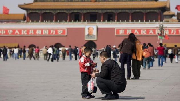 A father and son at Gate of Heavenly Peace, Forbidden City. (Tim Graham/Getty Images) A father and son at Gate of Heavenly Peace, Forbidden City. (Tim Graham/Getty Images)