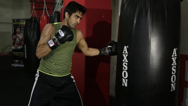 Indian boxer and WBO Asia-Pacific Super Middleweight champion Vijender Singh at a training session in Mumbai ahead of his fight against China's Zulpikar Maimaitiali. (AP) Indian boxer and WBO Asia-Pacific Super Middleweight champion Vijender Singh at a training session in Mumbai ahead of his fight against China's Zulpikar Maimaitiali. (AP)
