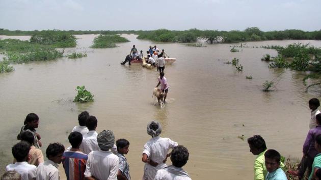 Villagers being moved to safer locations in Barmer.(HT Photo)