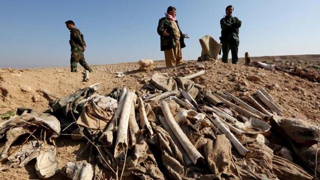 It is the latest of dozens of such grisly finds made by Iraqi forces since they drove the jihadists out of the swathes of northern and western Iraq that they occupied in 2014. In picture: View of a mass grave in the town of Sinjar after it was recaptured by the Iraqi force last year. (File photo for representation) It is the latest of dozens of such grisly finds made by Iraqi forces since they drove the jihadists out of the swathes of northern and western Iraq that they occupied in 2014. In picture: View of a mass grave in the town of Sinjar after it was recaptured by the Iraqi force last year. (File photo for representation)