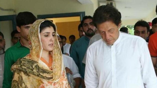 Pakistan Tehreek-e-Insaf chief Imran Khan seen with Ayesha Gulalai (left), a lawmaker from Pakistan’s tribal areas who has quit the party after accusing Khan of harassing its women leaders.(Twitter)