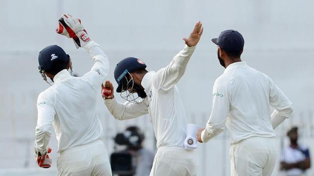 The Indians were clearly in a celebratory mood towards the end of the day, with KL Rahul (C) doing the dab to celebrate the fall of a wicket. (AFP)