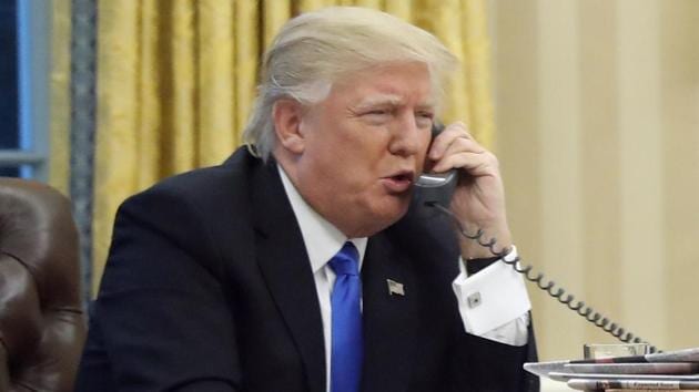US President Donald Trump speaks on the phone with Australian PM Malcolm Turnbull in January. Transcripts of Trump’s conversations with the leaders of Mexico and Australia have leaked out. (AP) US President Donald Trump speaks on the phone with Australian PM Malcolm Turnbull in January. Transcripts of Trump’s conversations with the leaders of Mexico and Australia have leaked out. (AP)