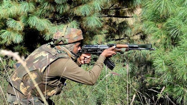An Army soldier taking position during an encounter with militants in Keran sector of Jammu and Kashmir.(PTI File Photo)