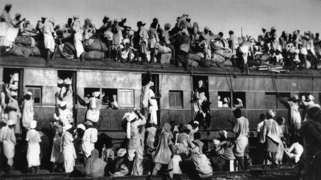 In this September 1947 photo, Muslims sit on the roof of an overcrowded train near New Delhi while trying to relocate from India after Partition. (AP) In this September 1947 photo, Muslims sit on the roof of an overcrowded train near New Delhi while trying to relocate from India after Partition. (AP)