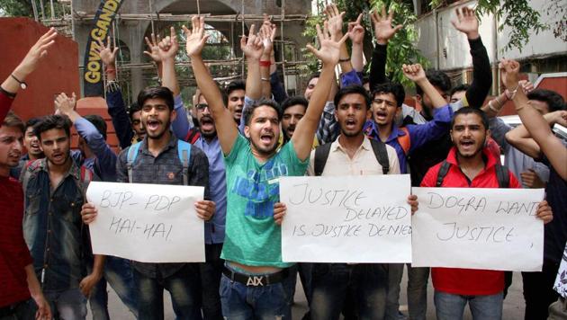 Activists of Jammu Justice Secular Forum (JJSF) and students display placards against 'imposition' of Kashmiri language in Jammu Colleges, in Jammu. (PTI Photo) Activists of Jammu Justice Secular Forum (JJSF) and students display placards against 'imposition' of Kashmiri language in Jammu Colleges, in Jammu. (PTI Photo)