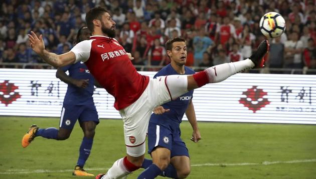 Arsenal's Olivier Giroud, front, takes a shot on goal past Chelsea's Cesar Azpilicueta during the second half of their friendly soccer match in Beijing. (AP) Arsenal's Olivier Giroud, front, takes a shot on goal past Chelsea's Cesar Azpilicueta during the second half of their friendly soccer match in Beijing. (AP)