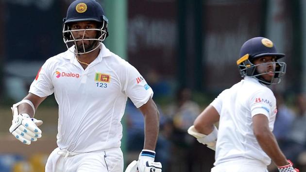 Dimuth Karunaratne (L) and teammate Kusal Mendis run between the wickets during the third day of the second Test match between Sri Lanka and India. Catch live updates and live cricket score of India vs Sri Lanka, 2nd Test, Day 3, here (AFP) Dimuth Karunaratne (L) and teammate Kusal Mendis run between the wickets during the third day of the second Test match between Sri Lanka and India. Catch live updates and live cricket score of India vs Sri Lanka, 2nd Test, Day 3, here (AFP)