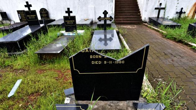 In some places the headstones on the graves and niches – where families preserve the mortal remains of a departed member – were broken. (Ajay Aggarwal/HT PHOTO)