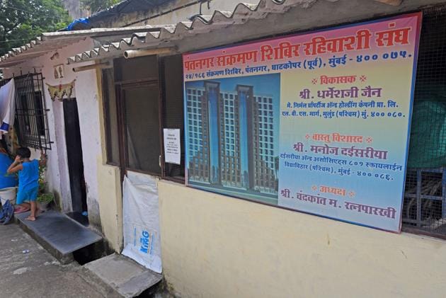 A redevelopment project board at Pant Nagar transit camp in Ghatkopar on Friday. (Pratik Chorge/HT Photo) A redevelopment project board at Pant Nagar transit camp in Ghatkopar on Friday. (Pratik Chorge/HT Photo)