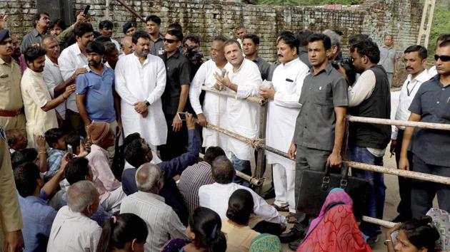 Congress vice president Rahul Gandhi interacts with the flood-affected people during his visit to Banaskantha district of Gujarat on Friday. (PTI) Congress vice president Rahul Gandhi interacts with the flood-affected people during his visit to Banaskantha district of Gujarat on Friday. (PTI)