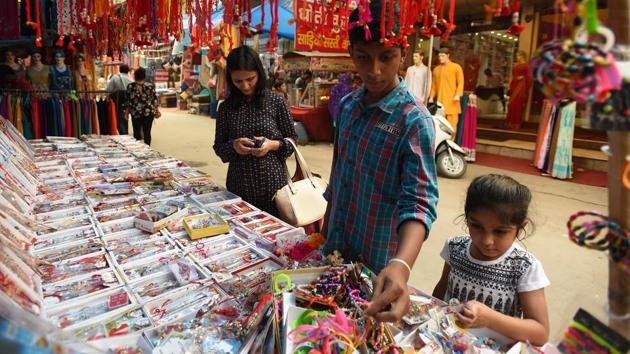 People are opting for rakhis ‘made in India’, which has resulted in a massive dip in the demand and sale of Chinese ones ahead of Rakshabandhan, sellers said. (Virendra Singh Gosain/HT PHOTO) People are opting for rakhis ‘made in India’, which has resulted in a massive dip in the demand and sale of Chinese ones ahead of Rakshabandhan, sellers said. (Virendra Singh Gosain/HT PHOTO)