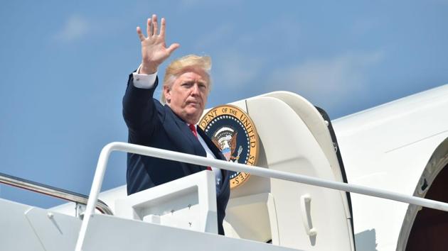 US President Donald Trump boards Air Force One on August 4, 2017, at Andrews Air Force Base in Maryland as he travels on a 17-day vacation to Trump's golf course in Bedminster, New Jersey. (AFP) US President Donald Trump boards Air Force One on August 4, 2017, at Andrews Air Force Base in Maryland as he travels on a 17-day vacation to Trump's golf course in Bedminster, New Jersey. (AFP)