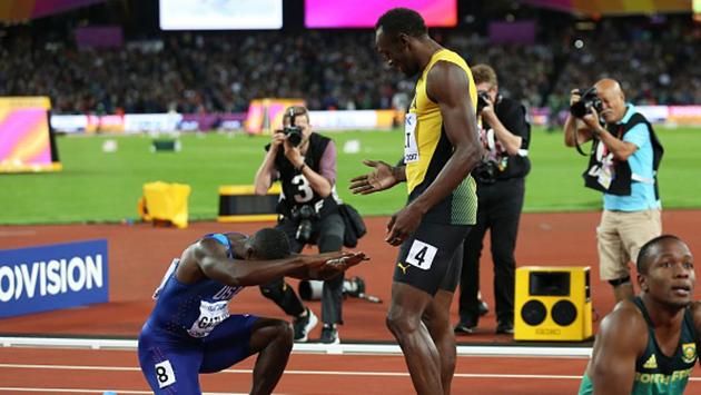 Gold medallist Justin Gatlin of the US bows down to the king of Athletics, Usain Bolt, after the men’s 100 metres final at the IAAF World Championships of Athletics on Saturday. (Getty Images)