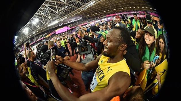 The victory lap soon began with Usain Bolt being the centre of attraction. The Jamaican posed with spectators, obliged them with celebratory moves after the 100m race at the IAAF World Championships of Athletics. (Getty Images)