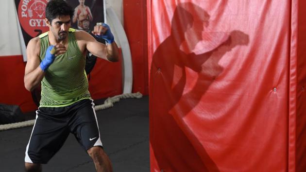 Indian boxer and WBO Asia-Pacific Super Middleweight champion Vijender Singh trains in Mumbai. Singh will fight WBO Oriental Super Middleweight champion China's Zulpikar Maimaitiali in a double title fight on August 5 in Mumbai. (INDRANIL MUKHERJEE / AFP) Indian boxer and WBO Asia-Pacific Super Middleweight champion Vijender Singh trains in Mumbai. Singh will fight WBO Oriental Super Middleweight champion China's Zulpikar Maimaitiali in a double title fight on August 5 in Mumbai. (INDRANIL MUKHERJEE / AFP)