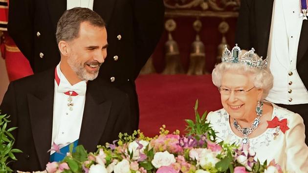 Britain's Queen Elizabeth II (R) and Spanish King Felipe VI chat during a State Banquet at Buckingham Palace in central London on July 12, 2017. During his visit, King Felipe VI had called for a deal on the status of Gibraltar that would be "acceptable to all" raising a thorny dispute. (AFP) Britain's Queen Elizabeth II (R) and Spanish King Felipe VI chat during a State Banquet at Buckingham Palace in central London on July 12, 2017. During his visit, King Felipe VI had called for a deal on the status of Gibraltar that would be "acceptable to all" raising a thorny dispute. (AFP)
