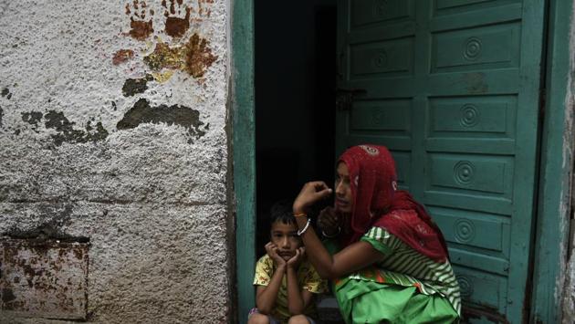 People have resorted to superstition and use green chillis and lemon to hang outside their doors, and also other things like neem leaves and make hand marks. In a rather unique case, women of Kangaan Heda village have lost their ponytails suddenly after a severe headache in New Delhi, India. (Saumya Khandelwal/HT PHOTO) People have resorted to superstition and use green chillis and lemon to hang outside their doors, and also other things like neem leaves and make hand marks. In a rather unique case, women of Kangaan Heda village have lost their ponytails suddenly after a severe headache in New Delhi, India. (Saumya Khandelwal/HT PHOTO)