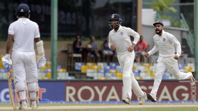 Sri Lanka’s trouble began when Ravindra Jadeja dismissed Dinesh Chandimal, with the World No. 1 in Tests getting plenty of turn and bounce. (AP)