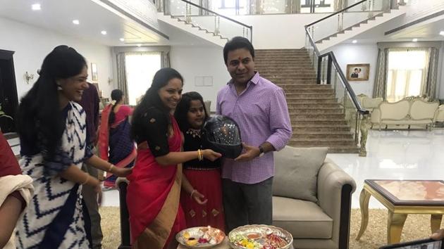 Nizamabad MP Kalvakuntla Kavitha of the Telangana Rashtra Samithi gifting a helmet to her brother, Telangana IT minister KT Rama Rao on Raksha Bandhan to promote road safety for two-wheeler riders. (HT PHOTO) Nizamabad MP Kalvakuntla Kavitha of the Telangana Rashtra Samithi gifting a helmet to her brother, Telangana IT minister KT Rama Rao on Raksha Bandhan to promote road safety for two-wheeler riders. (HT PHOTO)
