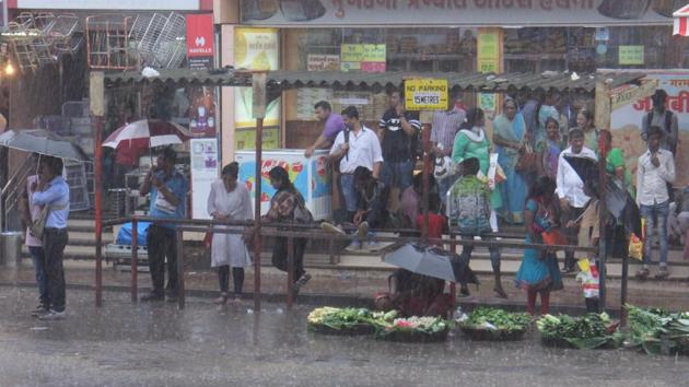 Commuters wait in vain at a bus stop in Borivli. (Pramod Thakur/ HT) Commuters wait in vain at a bus stop in Borivli. (Pramod Thakur/ HT)