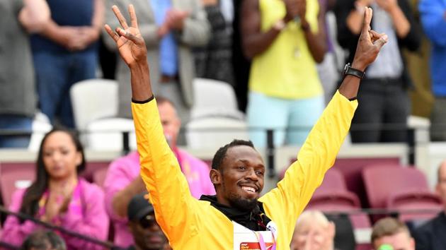 Usain Bolt acknowledges the cheer from the crowd after receiving his medal during the podium ceremony of the men’s 100m event at the IAAF World Championships of Athletics in London on Sunday. (AFP)