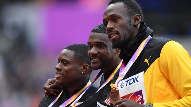 (L to R) Silver medallist Christian Coleman, gold medallist Justin Gatlin (C) and bronze medallist Usain Bolt (R) on the podium of the men’s 100m event at the IAAF World Championships of Athletics in London on Sunday. (AFP)