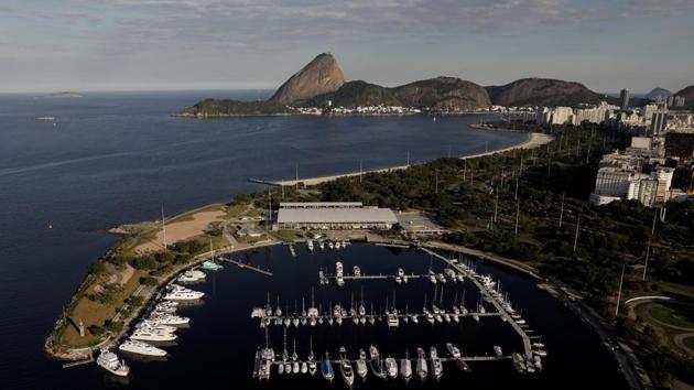 Rio organizers promised to clean up polluted Guanabara Bay in their winning bid in 2009. During the Olympics, officials used stopgap measures to keep floating sofas, logs, and dead animals from crashing into boats during the sailing events. The bankruptcy since the Olympics ceased major efforts to clean the bay. (Ricardo Moraes/REUTERS)