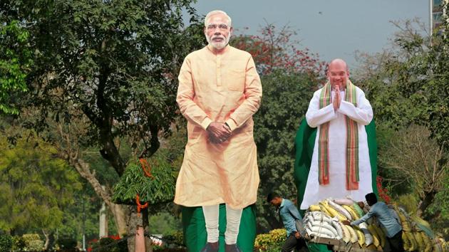 Giant cardboard cut outs of Prime Minister Narendra Modi and Bharatiya Janata Party president Amit Shah, New Delhi (REUTERS) Giant cardboard cut outs of Prime Minister Narendra Modi and Bharatiya Janata Party president Amit Shah, New Delhi (REUTERS)