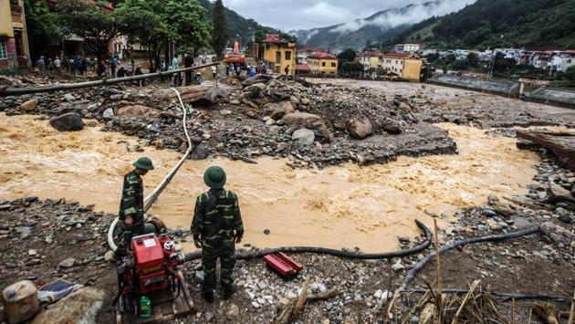 According to witnesses in Yen Bai province, floods tore through villages on Thursday night, carrying with them large boulders from the mountains. (AFP) According to witnesses in Yen Bai province, floods tore through villages on Thursday night, carrying with them large boulders from the mountains. (AFP)
