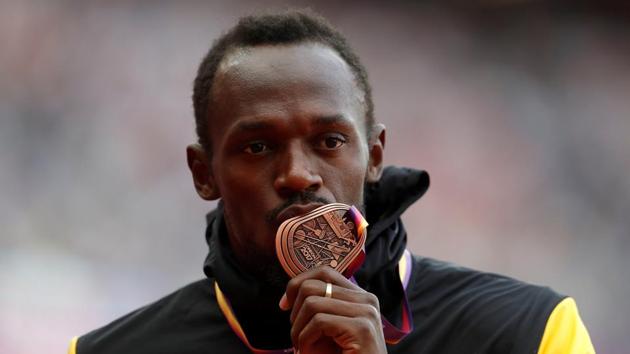 Usain Bolt of Jamaica with his bronze medal after the podium ceremony of the men’s 100m event at the IAAF World Championships of Athletics in London on Sunday. The race, which was Bolt’s final solo competitive event, was won by Justin Gatlin of the US, while the sliver medal went to American Christian Coleman (REUTERS)